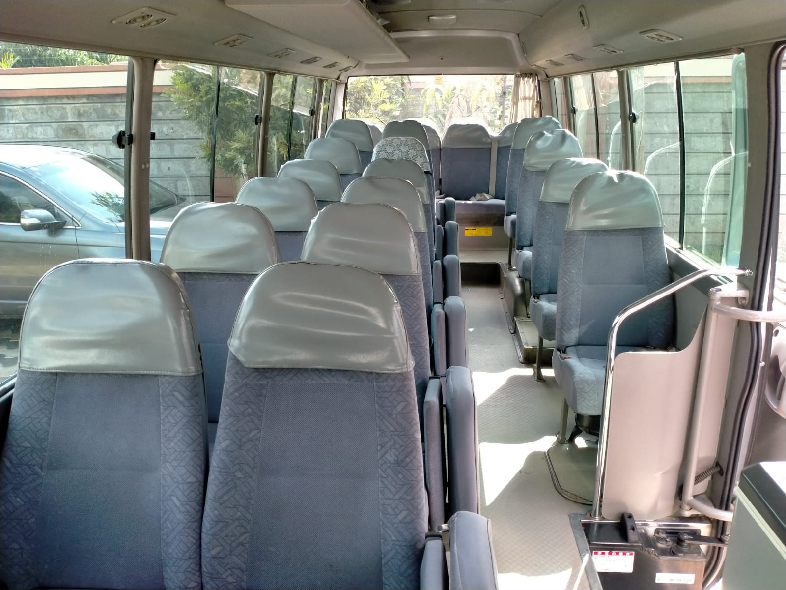 Hino Coaster Interior for car hire in Nairobi