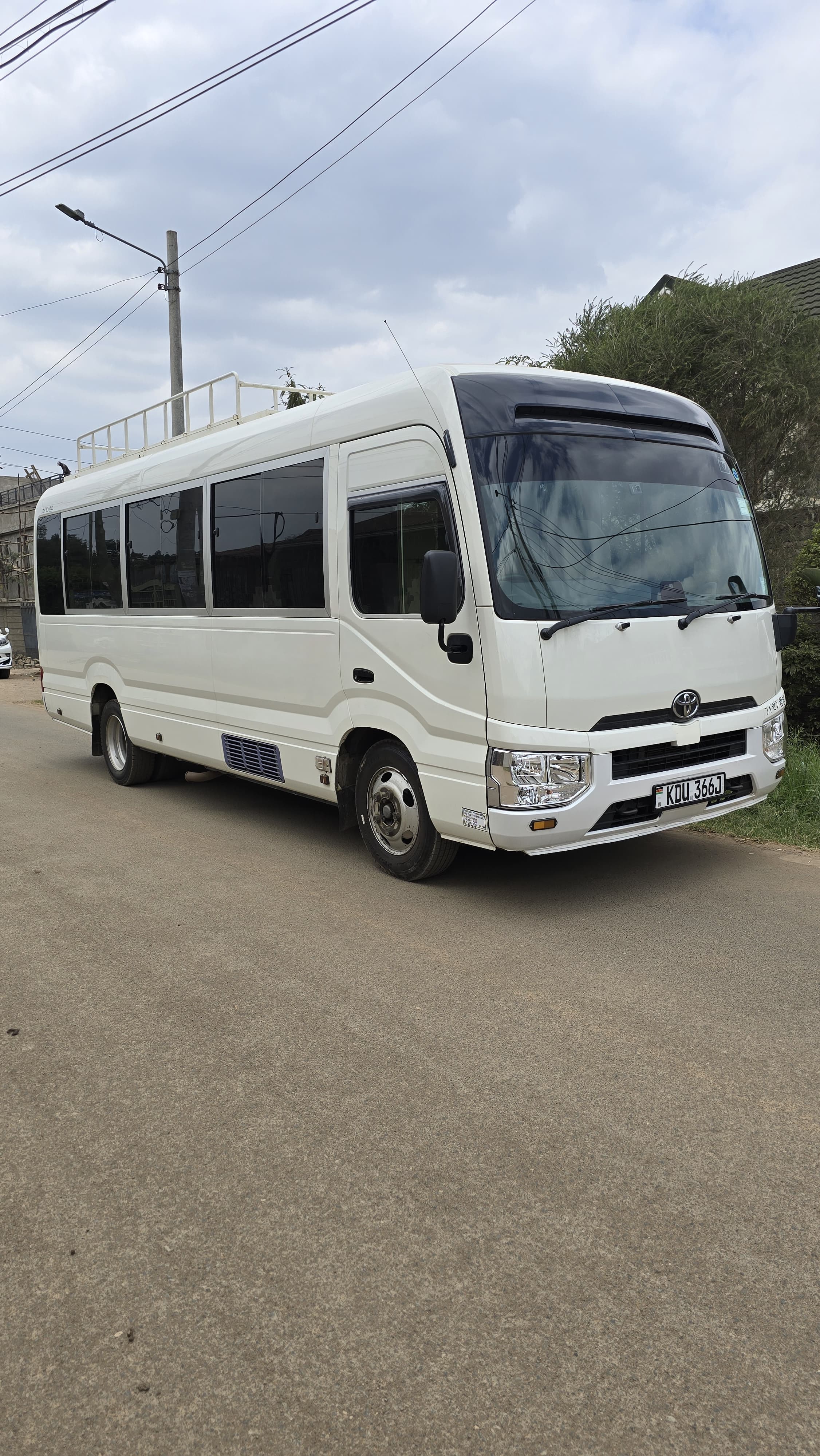 Hino Coaster (White) for car hire in Nairobi